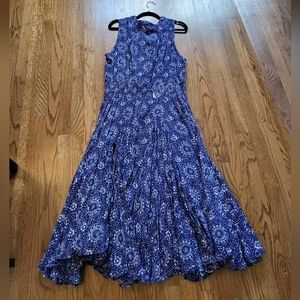 Beautiful fit and flare dress with pockets and button front